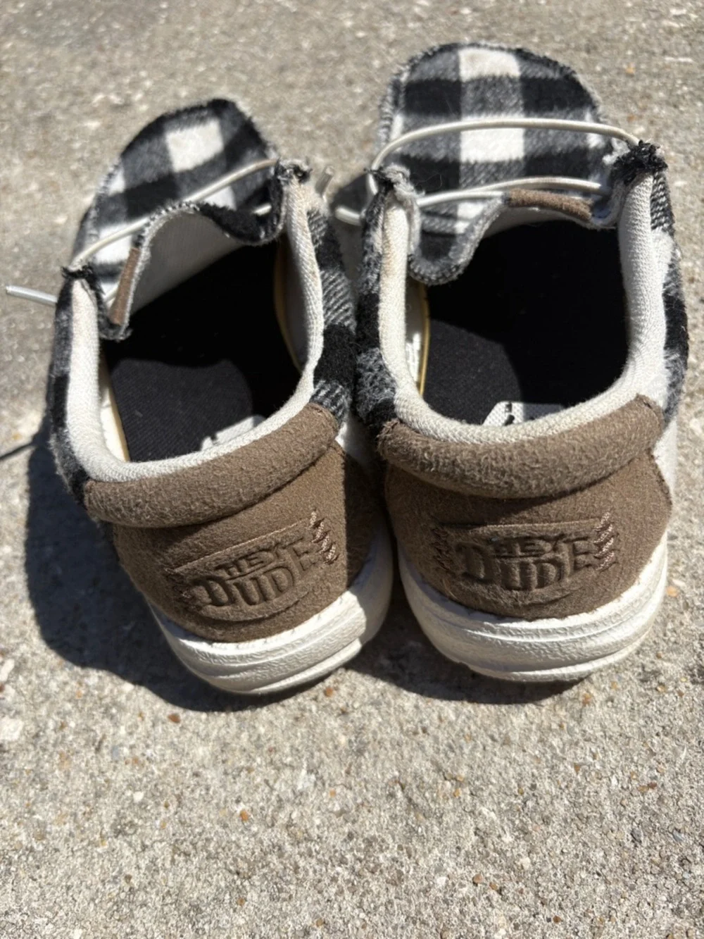 Hey Dude Plaid Slip-On Shoes in Black and White